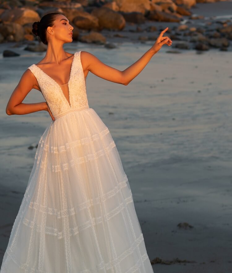 Model wearing a bridal collection gown. Mobile image