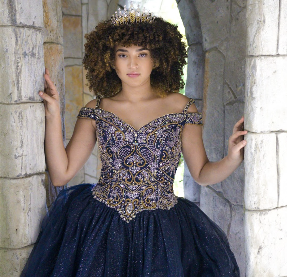 Model wearing a dark-blue gown