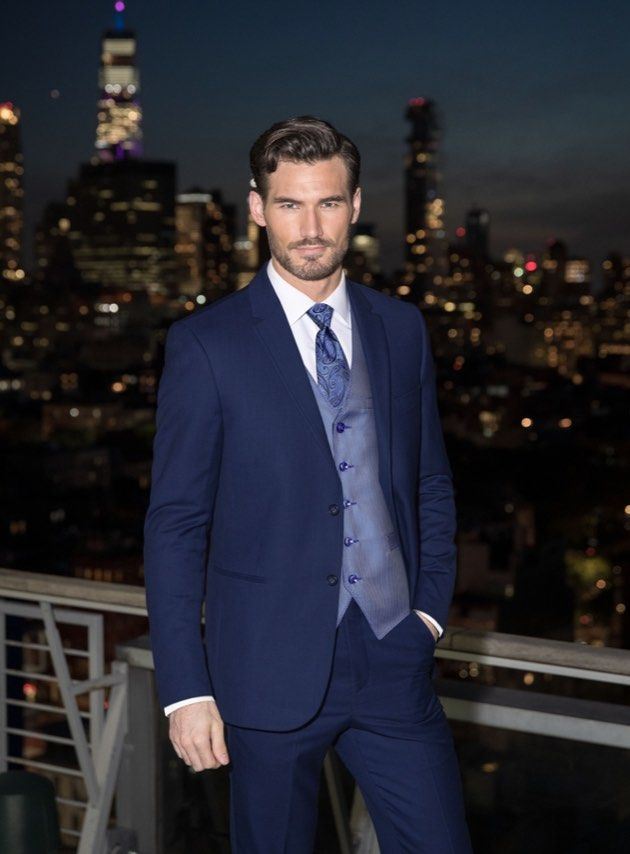 Groom in navy tuxedo