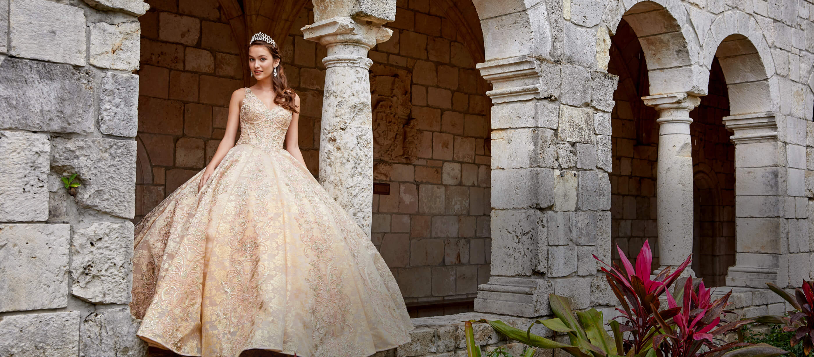 Model wearing a white gown. Mobile image